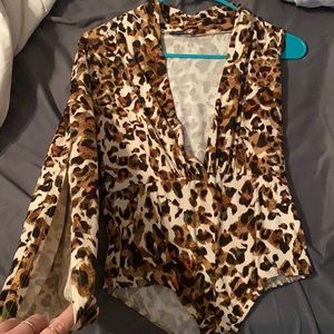 One sleeve bodysuit